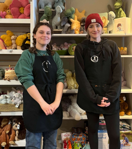 Baristas Regan Miller and Madi Dobie at The Doorway are happy to make you a coffee and then help you shop, especially when choosing the cutest Jellycat stuffie.